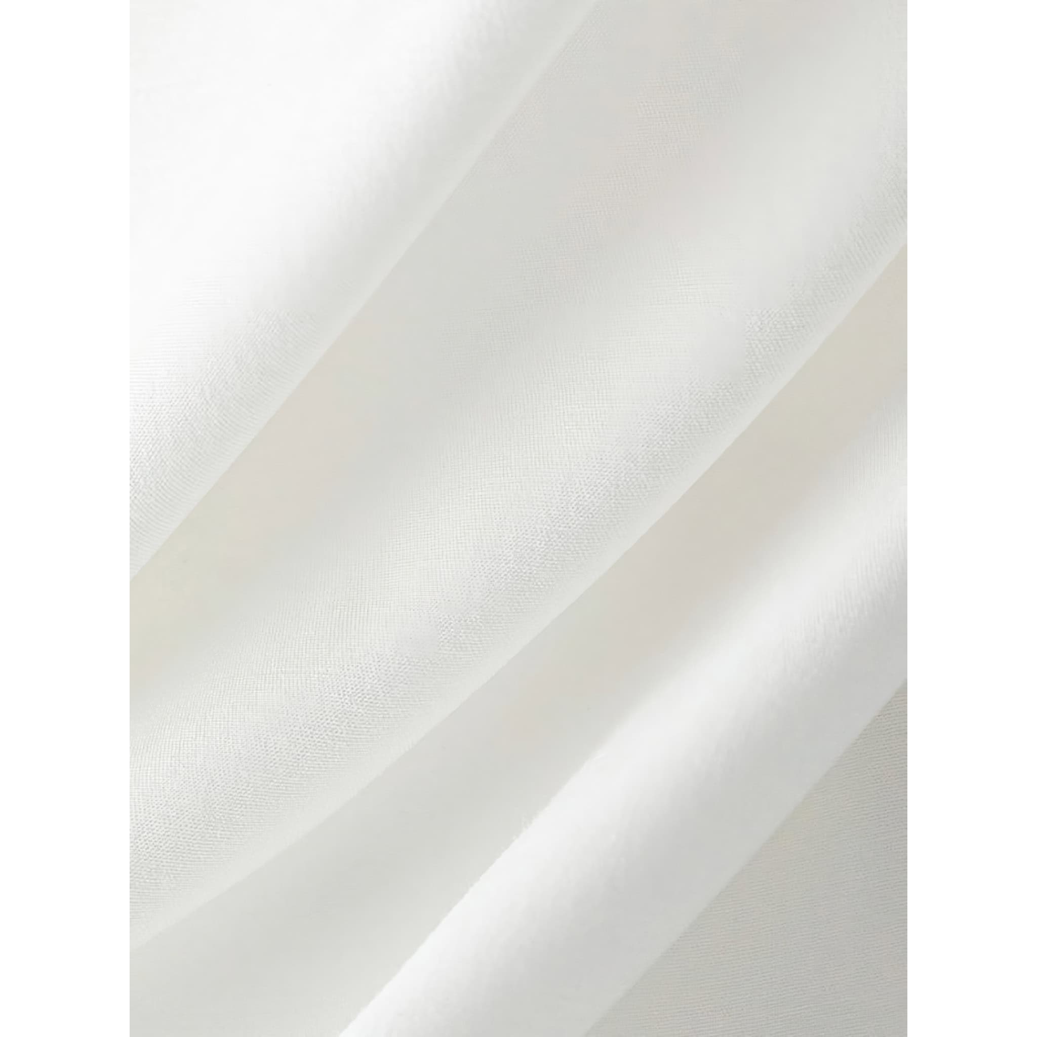 Close-up of white medical curtain fabric, showing smooth texture, ideal for healthcare settings and medical offices.