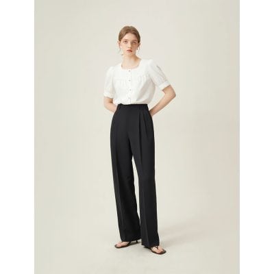 Highly stylish and comfortable women's black wide-leg trousers paired with a white blouse, ideal for medical, office, or casual wear.