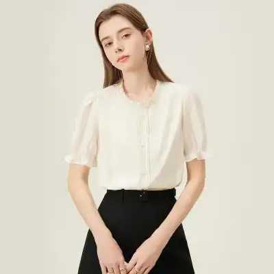 Chic white blouse with puff sleeves, embroidered details, and button front, perfect for stylish office wear or casual outings, available at Monalisa Store.