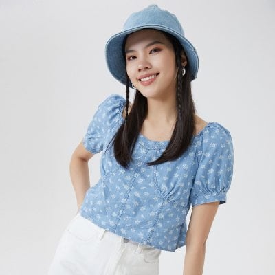 Comfortable blue floral blouse with puff sleeves, perfect for summer and casual outings. Great for pairing with jeans or skirts for a chic look.
