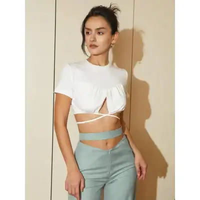 Effortless chic crop top for women featuring cutout details, ideal for fashionable casual wear. Explore Monalisa Store for trendy women's fashion, exclusive styles, and top-quality clothing options.