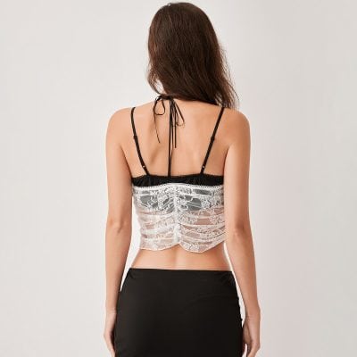Elegant lace lingerie top for women, stylish and comfortable, perfect for intimate wear. Crafted with delicate lace and adjustable straps for a fashionable fit.