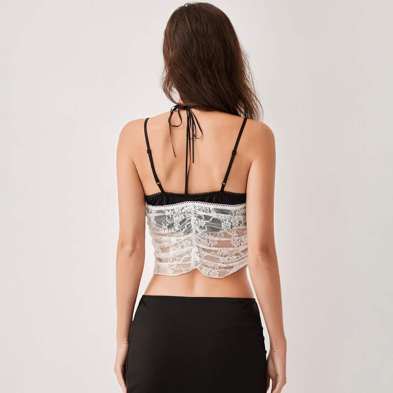 Elegant lace lingerie top for women, stylish and comfortable, perfect for intimate wear. Crafted with delicate lace and adjustable straps for a fashionable fit.