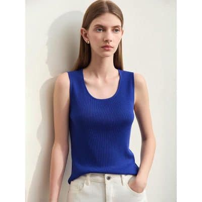 Elegant blue sleeveless top for women, perfect for casual or office wear. Made from comfortable, high-quality fabric with a flattering fit.