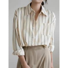 Stylish women's striped button-up blouse perfect for office or casual wear, available at Monalisa Store. Elevate your wardrobe with classic, versatile fashion essentials.