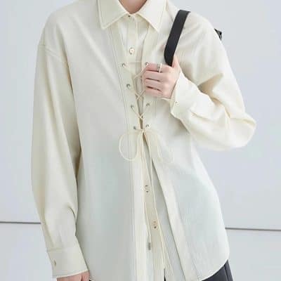 Soft, stylish women's shirt with lace-up front for versatile fashion. Perfect for casual or office wear, blending comfort and trendy design seamlessly.