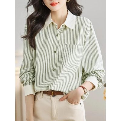 Optical clear image of a woman wearing a stylish striped button-up shirt with a white collar, perfect for office or casual wear.
