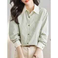 Optical and trendy striped button-up shirt for women, perfect for casual or professional wear. Featuring a classic collar, chest pocket, and comfortable fit for stylish eye care professionals.