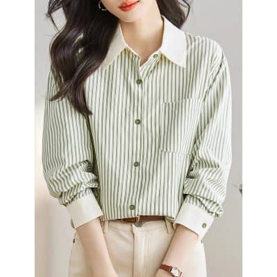 Optical and trendy striped button-up shirt for women, perfect for casual or professional wear. Featuring a classic collar, chest pocket, and comfortable fit for stylish eye care professionals.