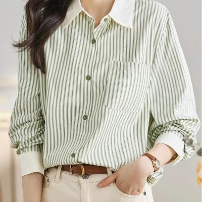 Stylish women's striped button-up shirt, perfect for casual or business wear, available at Monalisa Store for trendy fashion.