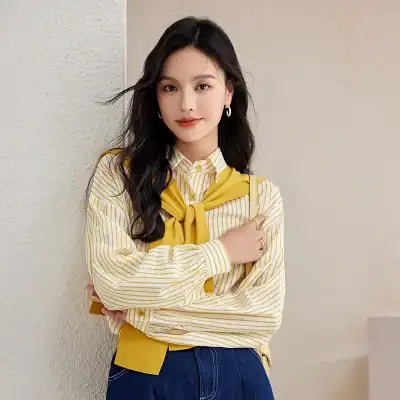 A fashionable young woman showcasing trendy glasses available at Monalisa Store, emphasizing eyewear for style and vision enhancement.