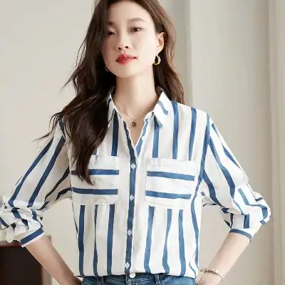 Elegant women’s striped blouse suitable for office or casual wear, made from breathable fabric with a classic button-up design in blue and white. Perfect for opt and fashion-conscious individuals.