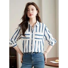 Elegant blue and white striped blouse perfect for fashionable eyewear shopping and optical store visits. Comfortable, trendy, and versatile for everyday wear.