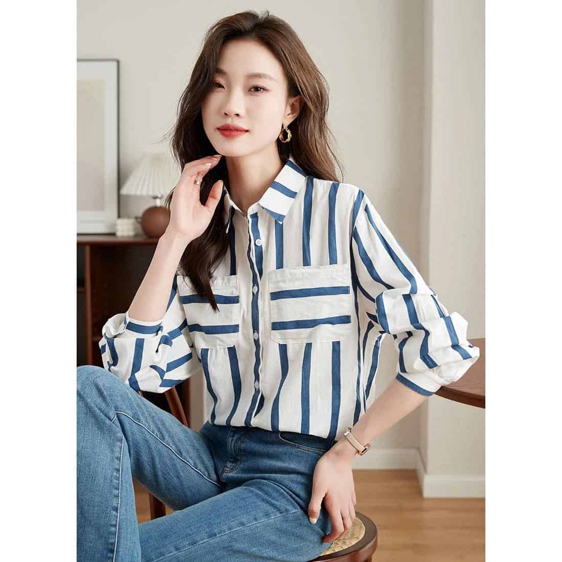 Stylish women’s striped shirt featuring a modern, casual design with a flattering fit, ideal for everyday fashion.