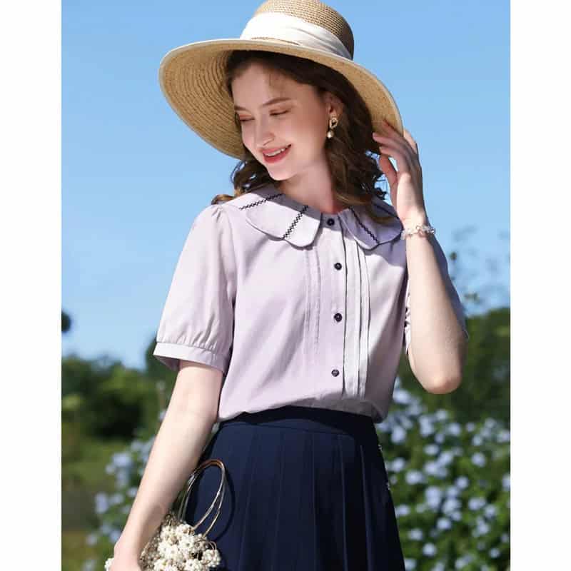 Stylish wide-brim straw hat perfect for sun protection, outdoor fashion, and summer accessories. Ideal for women seeking chic, comfortable hats to complement their summer outfits.