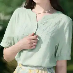 Embroidered women’s casual shirt featuring intricate embroidery, lightweight fabric, and comfortable fit, perfect for stylish everyday wear.