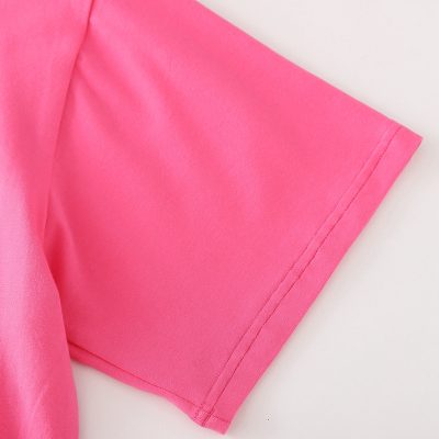 Bright pink casual T-shirt ideal for everyday wear, made from comfortable and durable fabric. Perfect for fashion-conscious individuals seeking quality opt clothing options.