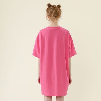 Comfortable oversized pink t-shirt dress perfect for casual wear and everyday comfort. Made from soft, breathable fabric, ideal for relaxed fashion styles.