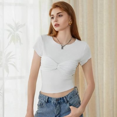 Young woman in casual white top and denim shorts with jewelry, urban style, fashion trend, summer casual wear, beauty and lifestyle, Monalisa Medical store.