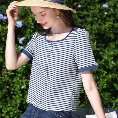 Elegant striped shirt for women with button-down front, perfect for casual summer outings. Made from comfortable, breathable fabric for a chic and relaxed look.