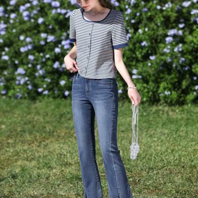 Comfortable women's flare jeans with front slit, perfect for casual summer outfits and outdoor activities.