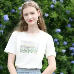 Dainty pearl earrings and matching headband on a young woman outdoors, highlighting Monalisa Store’s fashion jewelry collection for women.