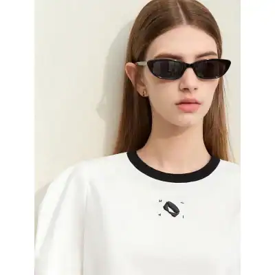 Stylish black sunglasses for women, perfect for fashion and sun protection at Monalisa Medical Store.