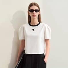 Fashionable woman wearing black sunglasses and casual outfit, showcasing stylish eyewear products at Monalisa Medical Store, perfect for modern and trendy eye accessories.