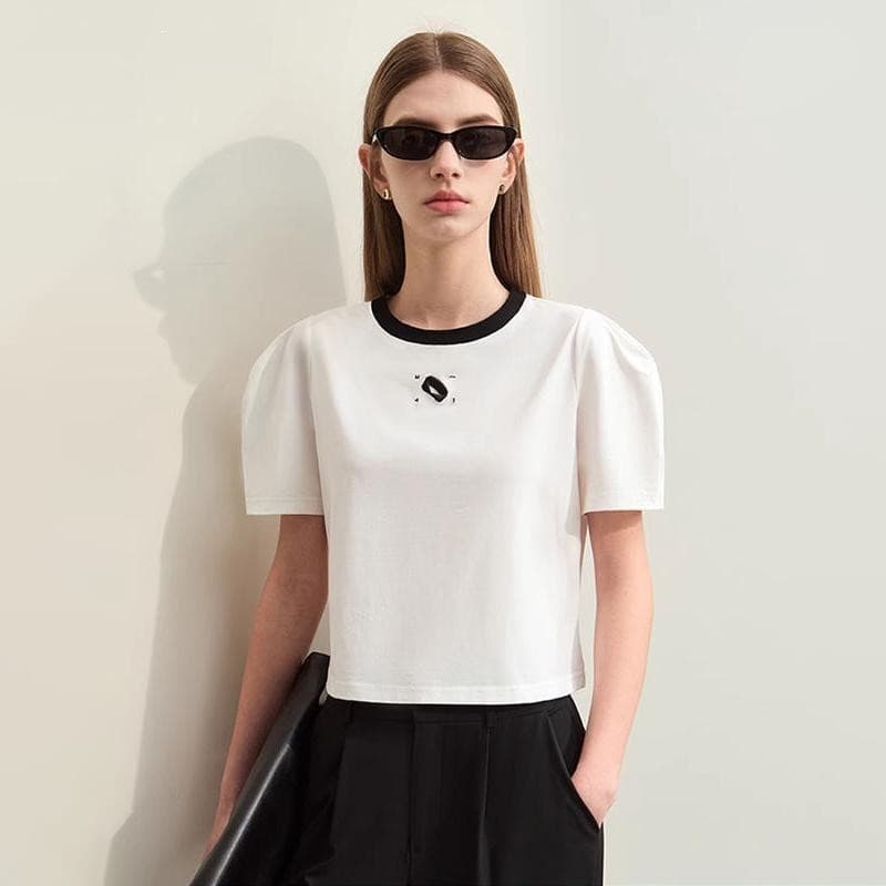 Fashionable woman wearing black sunglasses and casual outfit, showcasing stylish eyewear products at Monalisa Medical Store, perfect for modern and trendy eye accessories.