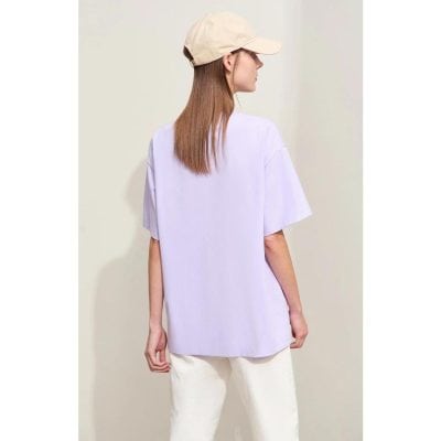 Elegant, comfortable women's casual top in pastel lavender, perfect for everyday wear, featuring a relaxed fit and short sleeves.