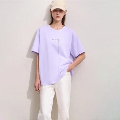 Casual lavender T-shirt with "Relaxation" print, perfect for comfort and style. Made from soft fabric, ideal for everyday wear or loungewear. Shop now for trendy women's clothing.