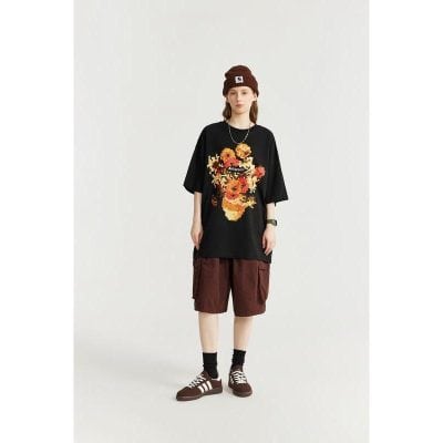 Casual streetwear outfit with graphic t-shirt and shorts for women, trendy and comfortable clothing from Monalisa Store. Perfect for everyday wear and stylish looks.