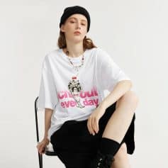 Stylish casual woman wearing sunglasses and trendy outfit, ideal for fashion-forward eyewear and accessories.