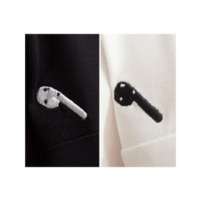 Embroidered headphone patch on black and white fabric, perfect for customizing clothing or accessories, ideal for fashion, style, and DIY apparel enthusiasts.