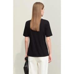 A woman showcasing smooth, shiny, and straight hair, ideal for professional or casual looks. Perfect for those seeking hair enhancement and care solutions at Monalisa Store.