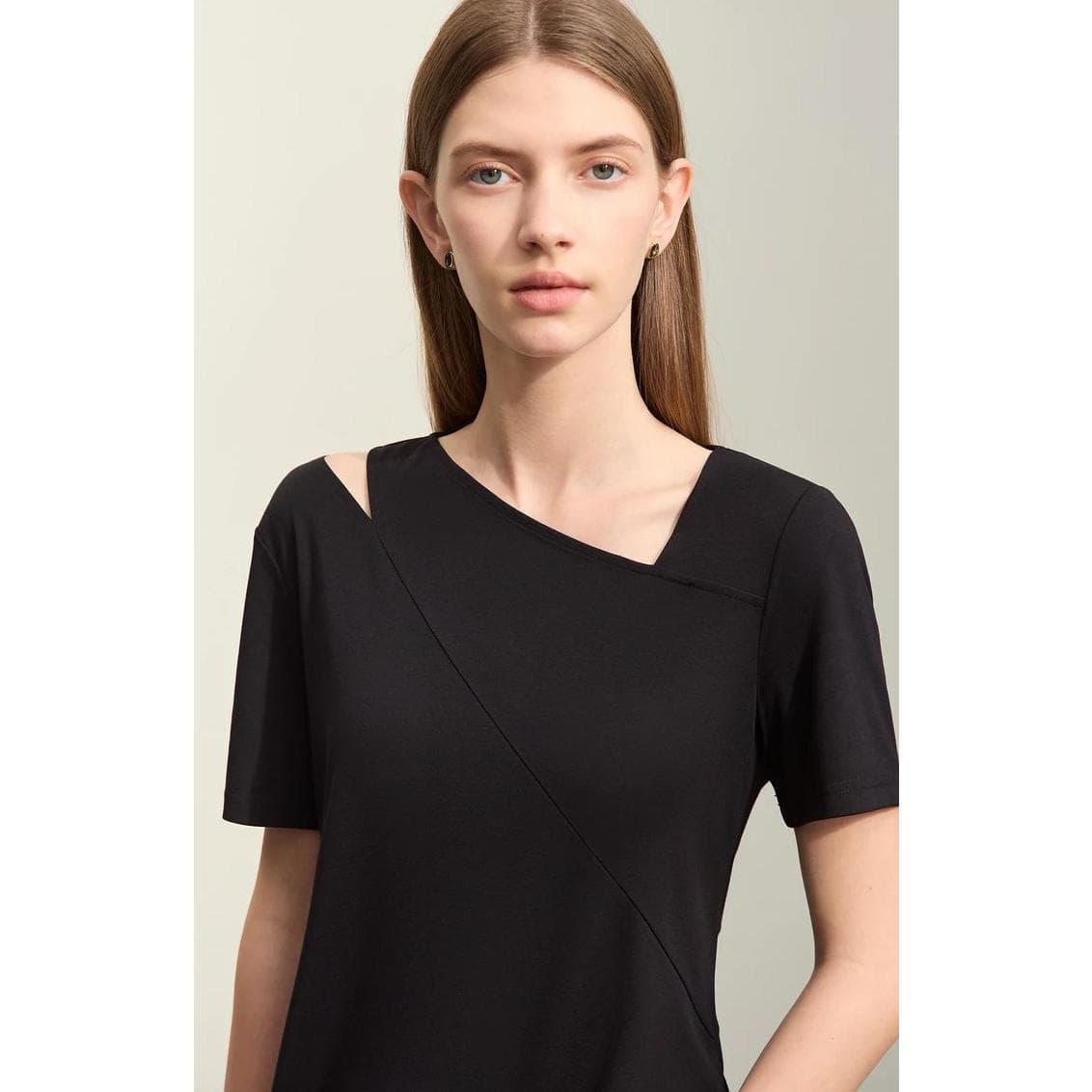 Stylish black optic dress perfect for a professional or casual look, designed with a modern cut and comfortable fabric for all-day wear. Ideal for women seeking fashionable, versatile clothing options.