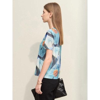 Stylish women's abstract print summer blouse for casual, office, or daily wear. Perfect for a trendy and comfortable look.