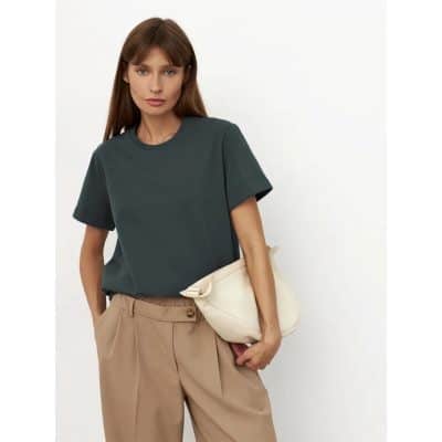 High-quality women's casual T-shirt ideal for opt health and stylish everyday wear, featuring a comfortable fit and versatile design in a neutral color palette.