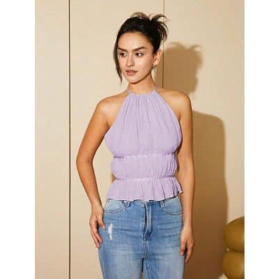 Elegant purple sleeveless halter top with ruffle details, perfect for casual or dressy occasions, available at Monalisa Store for fashionable eyewear enthusiasts.