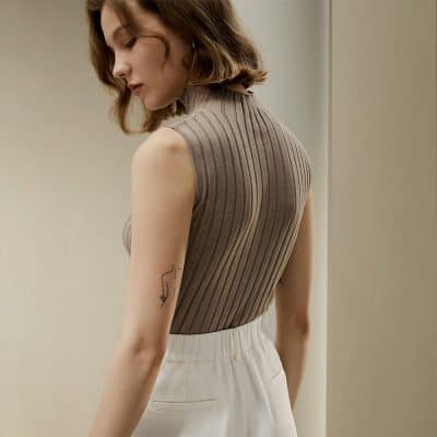Elegant sleeveless ribbed knit top for women, perfect for casual or office wear. Shop trendy women's clothing at Monalisa Store for quality and style.