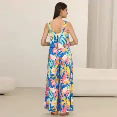 Bright floral print jumpsuit, perfect for summer fashion, casual outings, and stylish looks. Features adjustable straps, comfortable fit, and eye-catching design.