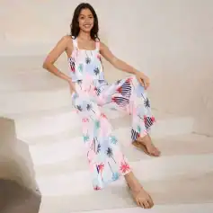 Vibrant summer jumpsuit featuring colorful palm tree patterns, perfect for beachwear, casual outings, and tropical vacations. Comfortable, stylish, and ideal for hot weather.