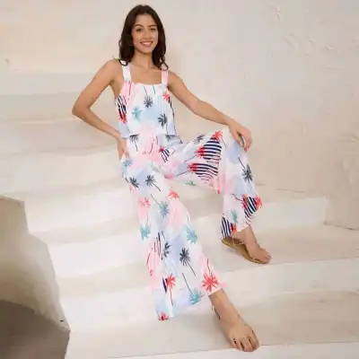 Vibrant summer jumpsuit featuring colorful palm tree patterns, perfect for beachwear, casual outings, and tropical vacations. Comfortable, stylish, and ideal for hot weather.