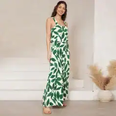 Stylish green leaf print jumpsuit from Monalisa Store, perfect for summer and casual wear. Trendy, comfortable, and ideal for outdoor events, making a fashion statement with vibrant botanical design.