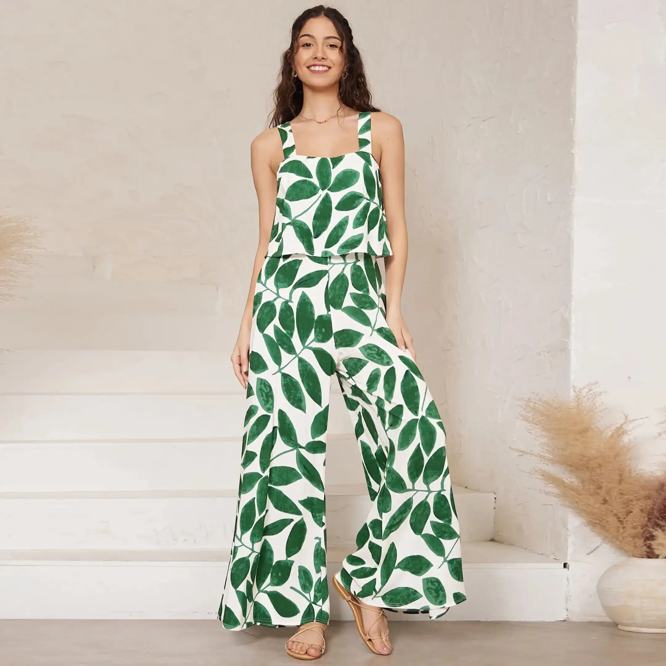 Stylish green leaf printed jumpsuit perfect for summer and resort wear at Monalisa Store. Comfortable, fashionable, and ideal for all-day wear, blending fashion with nature-inspired design.