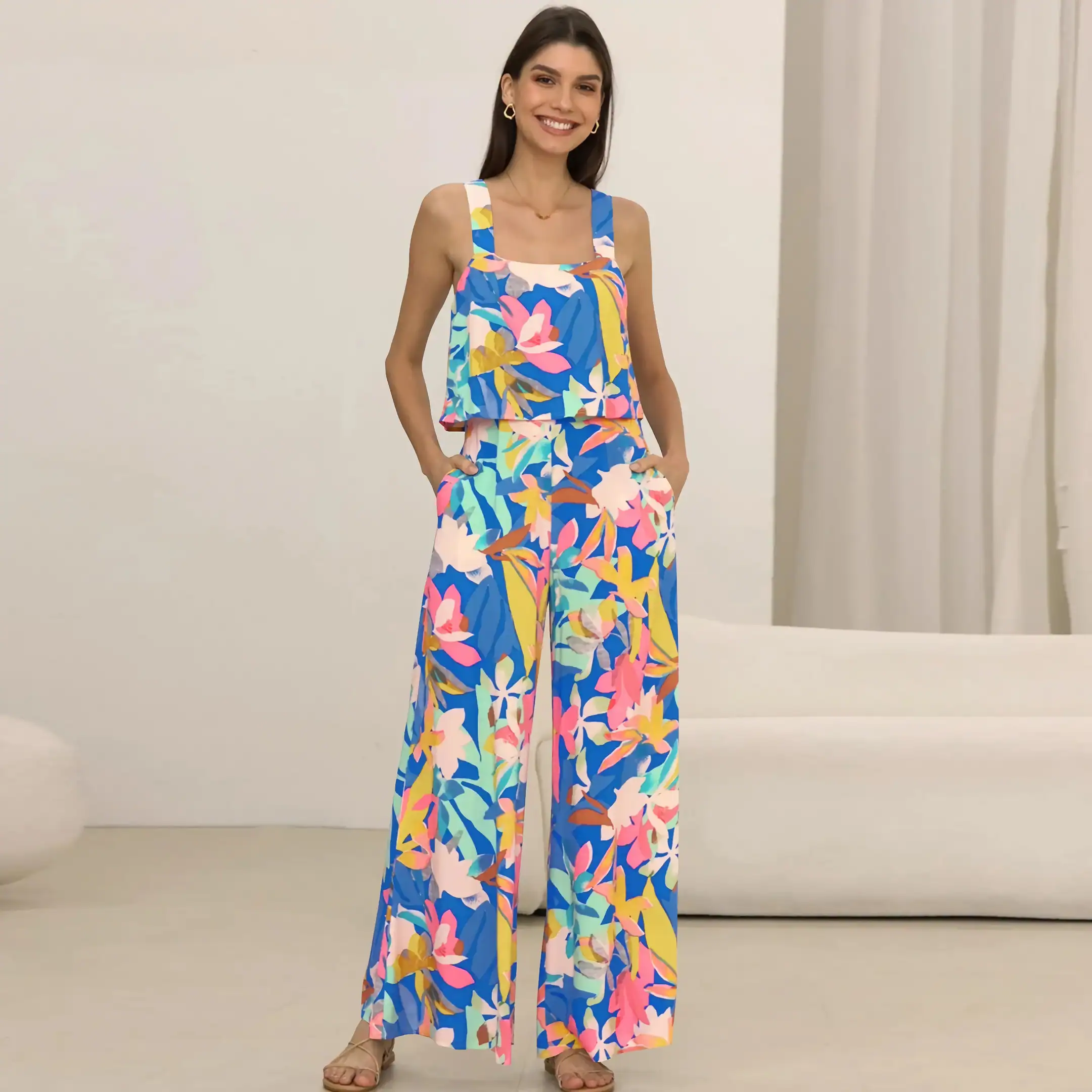 A cheerful bouquet of colors in a trendy women's floral jumpsuit, suitable for casual wear, summer outings, and resort fashion. Features a flattering fit and bold print.
