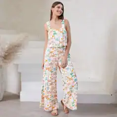 Women’s comfortable and colorful floral loungewear set, perfect for casual wear, home, or vacation, featuring a stylish sleeveless top and wide-leg pants.