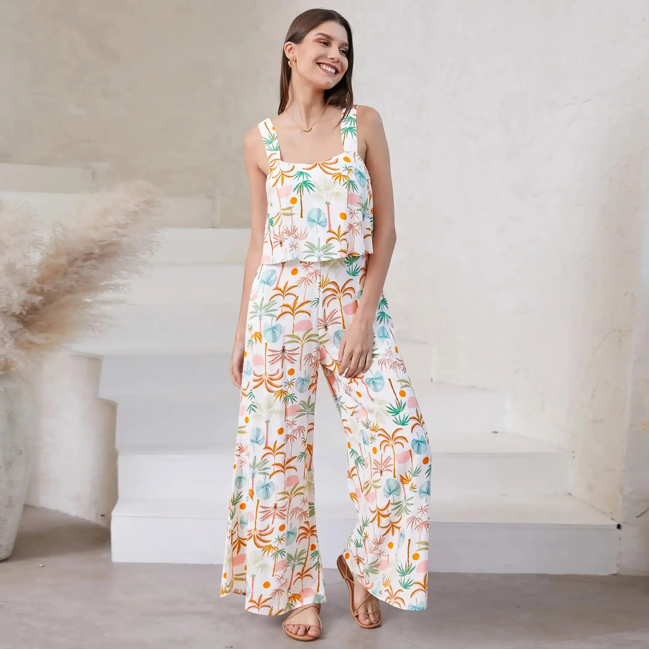Women’s comfortable and colorful floral loungewear set, perfect for casual wear, home, or vacation, featuring a stylish sleeveless top and wide-leg pants.