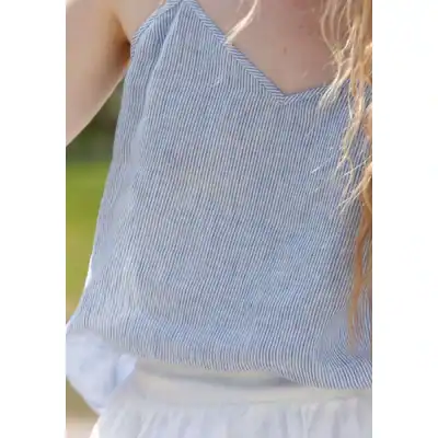 Light blue and white striped sleeveless top, suitable for warm weather, casual fashion, and everyday wear. Designed for comfort and style, available at Monalisa Store for fashion-conscious shoppers.