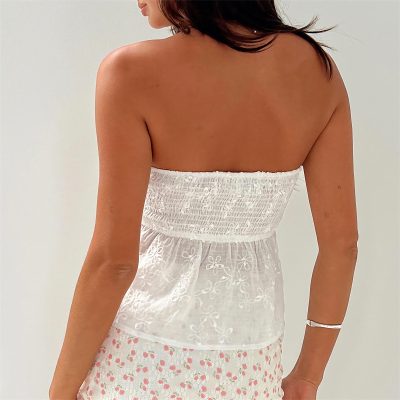 Lightweight strapless white dress with floral embroidery, suitable for summer, beachwear, or casual outings. Easy to wear, fashionable, and comfortable for warm climates.